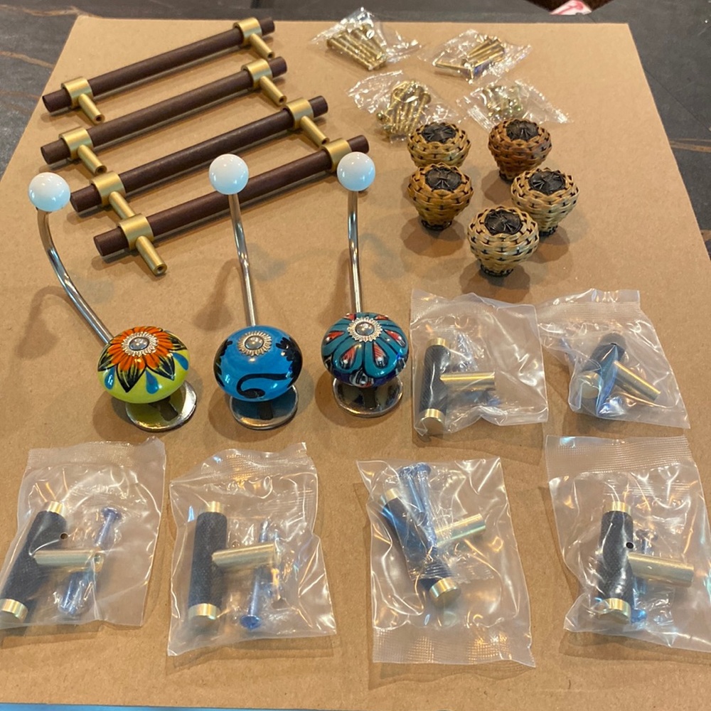Assorted knobs and hangers. New and used. New ones with hardware.